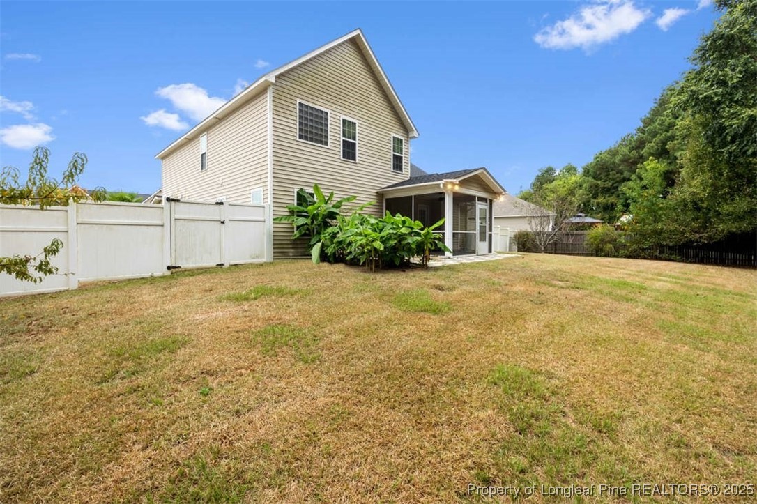 161 Bayleaf Drive Raeford, NC 28376 - Photo 31 of 33 a view of a house with backyard and garden