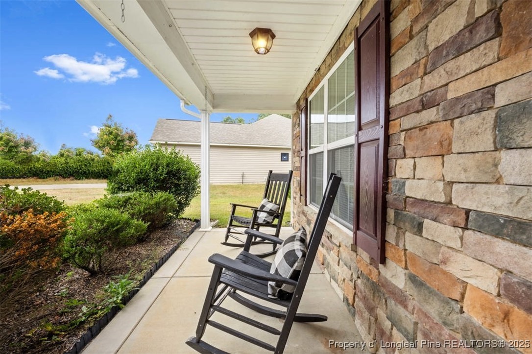 161 Bayleaf Drive Raeford, NC 28376 - Photo 5 of 33 a view of an outdoor space with seating