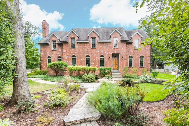3700 Glendenning Road Downers Grove, IL 60515 - Photo 1 of 25 front view of house with a yard and potted plants