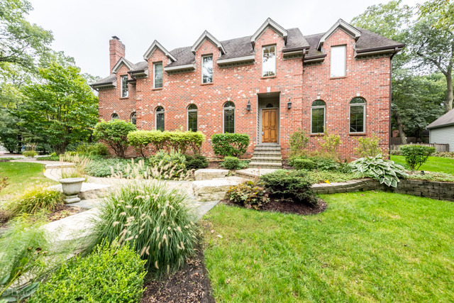 3700 Glendenning Road Downers Grove, IL 60515 - Photo 2 of 25 a front view of a house with a yard