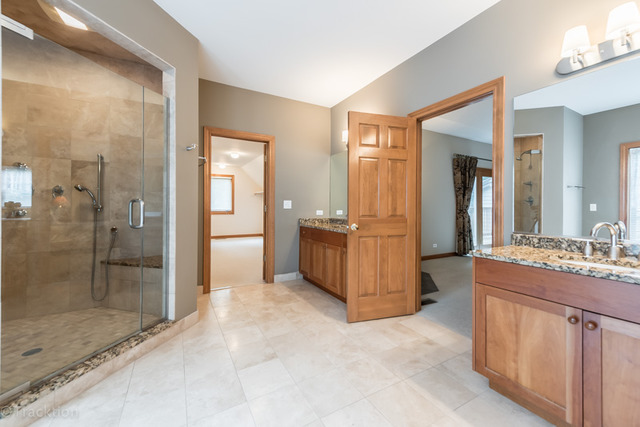 3700 Glendenning Road Downers Grove, IL 60515 - Photo 15 of 25 a spacious bathroom with a shower and a sink