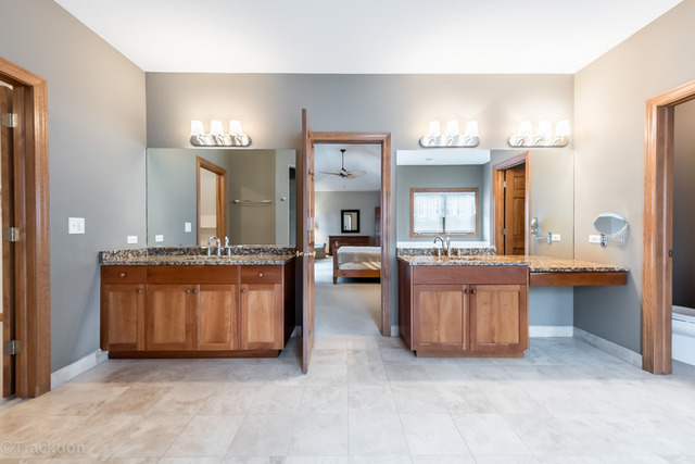 3700 Glendenning Road Downers Grove, IL 60515 - Photo 16 of 25 a large spacious bathroom with a large tub and sink