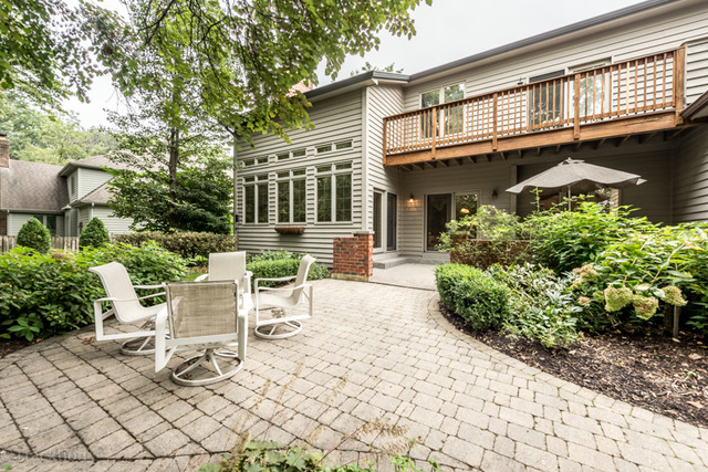 3700 Glendenning Road Downers Grove, IL 60515 - Photo 24 of 25 a view of a patio with table and chairs and potted plants