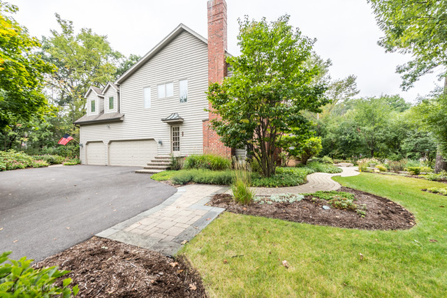 3700 Glendenning Road Downers Grove, IL 60515 - Photo 25 of 25 a front view of a house with a yard and garage