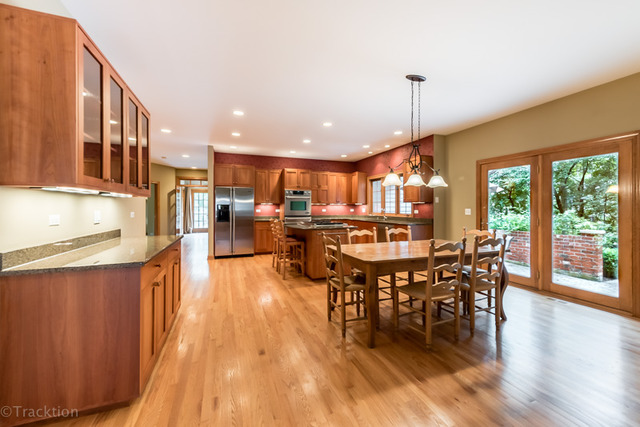 3700 Glendenning Road Downers Grove, IL 60515 - Photo 6 of 25 a view of a dining room with furniture window and wooden floor
