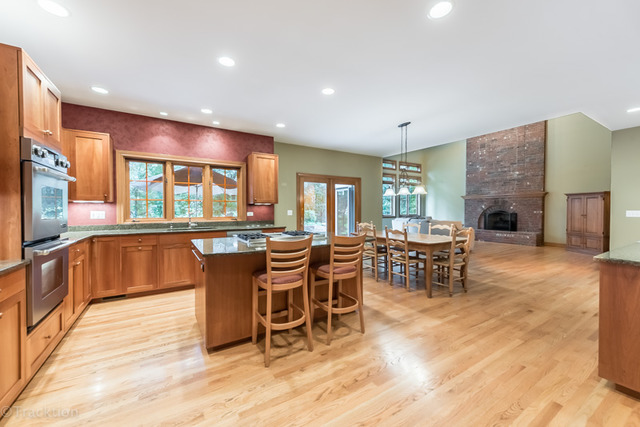 3700 Glendenning Road Downers Grove, IL 60515 - Photo 8 of 25 a dining area with a large window and table
