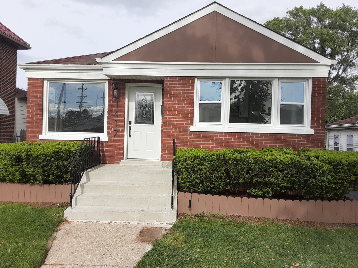 1417 Lee Boulevard Berkeley, IL 60163 - Photo 1 of 24 front view of a house with a yard