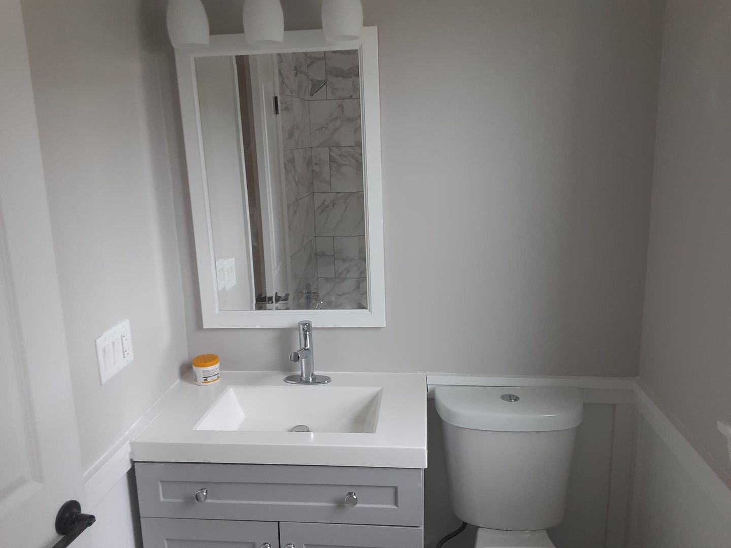 1417 Lee Boulevard Berkeley, IL 60163 - Photo 12 of 24 a bathroom with a sink mirror vanity and toilet