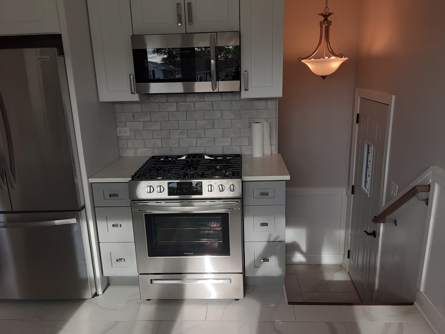 1417 Lee Boulevard Berkeley, IL 60163 - Photo 5 of 24 a stove top oven sitting inside of a kitchen