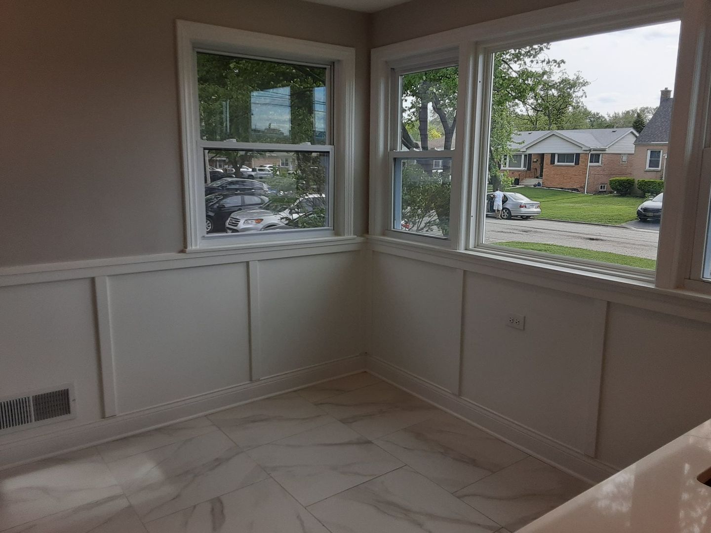 1417 Lee Boulevard Berkeley, IL 60163 - Photo 7 of 24 an empty room with wooden floor and a window