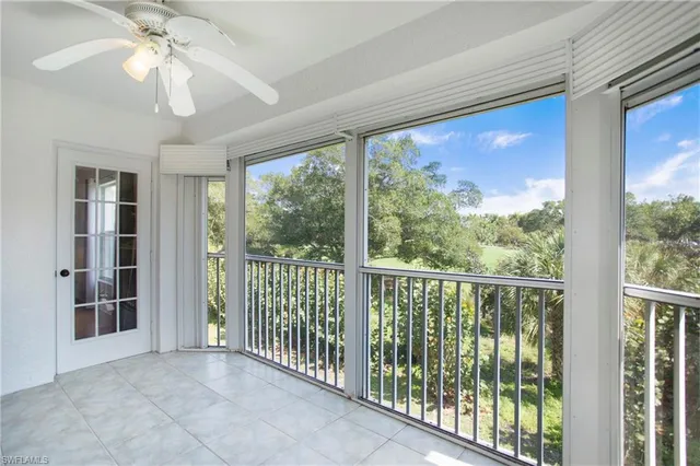 a view of a room with a large window