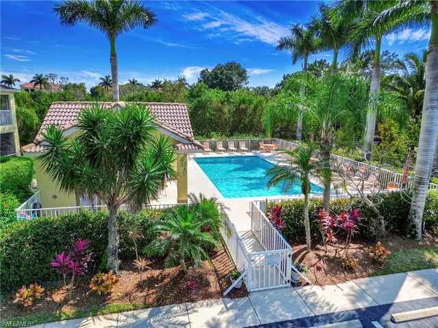 a view of an chairs and table in the patio