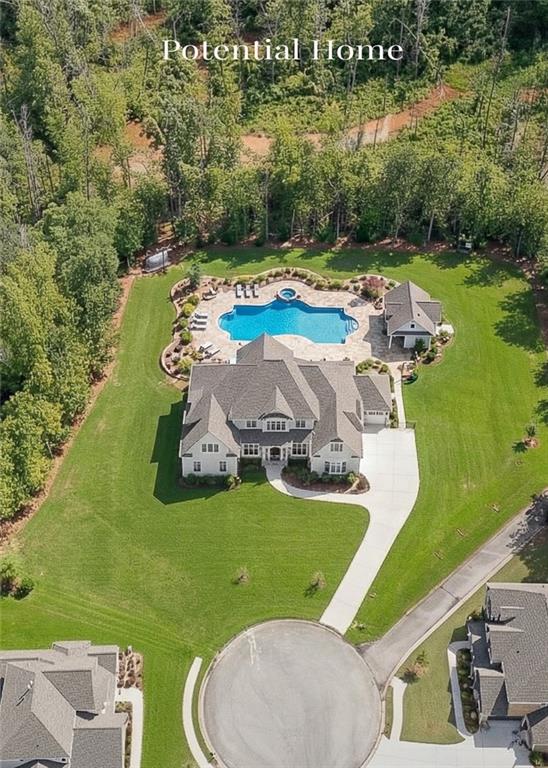 462 Manchester Lane Villa Rica, GA 30180 - Photo 2 of 13 a view of a swimming pool with a yard