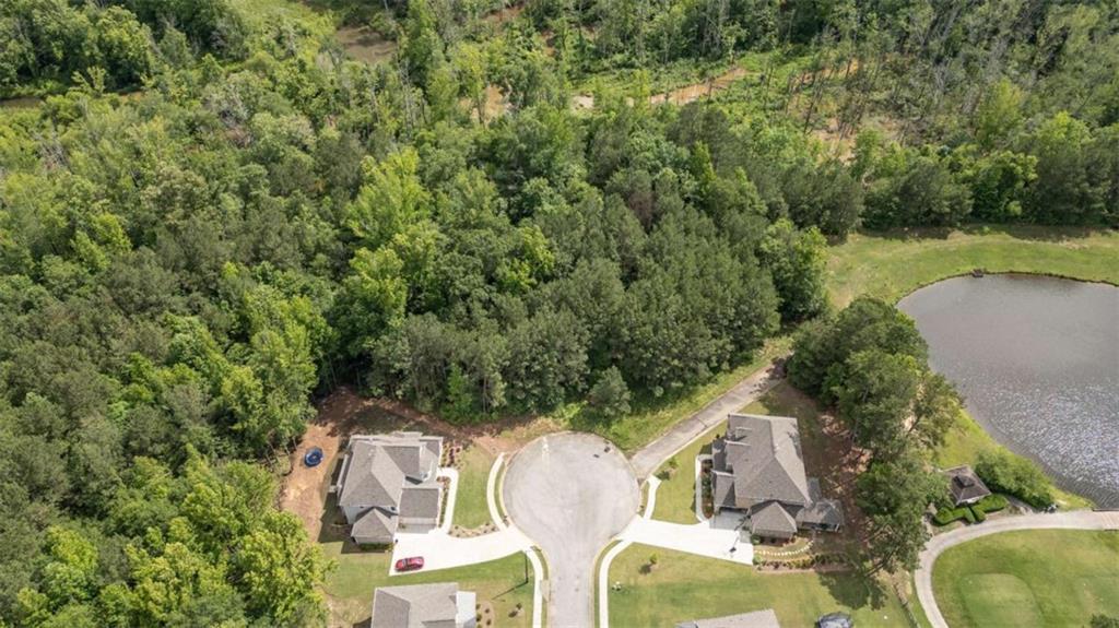 462 Manchester Lane Villa Rica, GA 30180 - Photo 5 of 13 an aerial view of a house with swimming pool and garden view