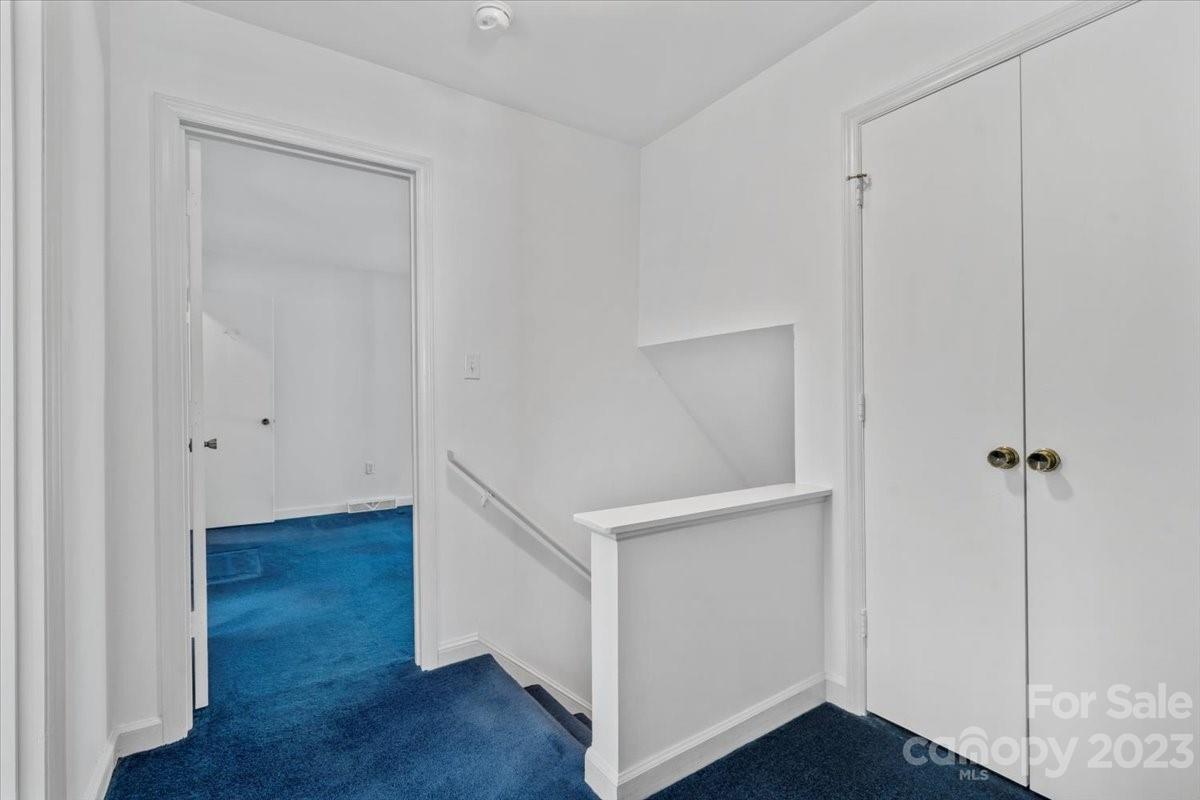 12112 Painted Tree Road Charlotte, NC 28226 - Photo 18 of 41 a view of an empty room with wooden floor