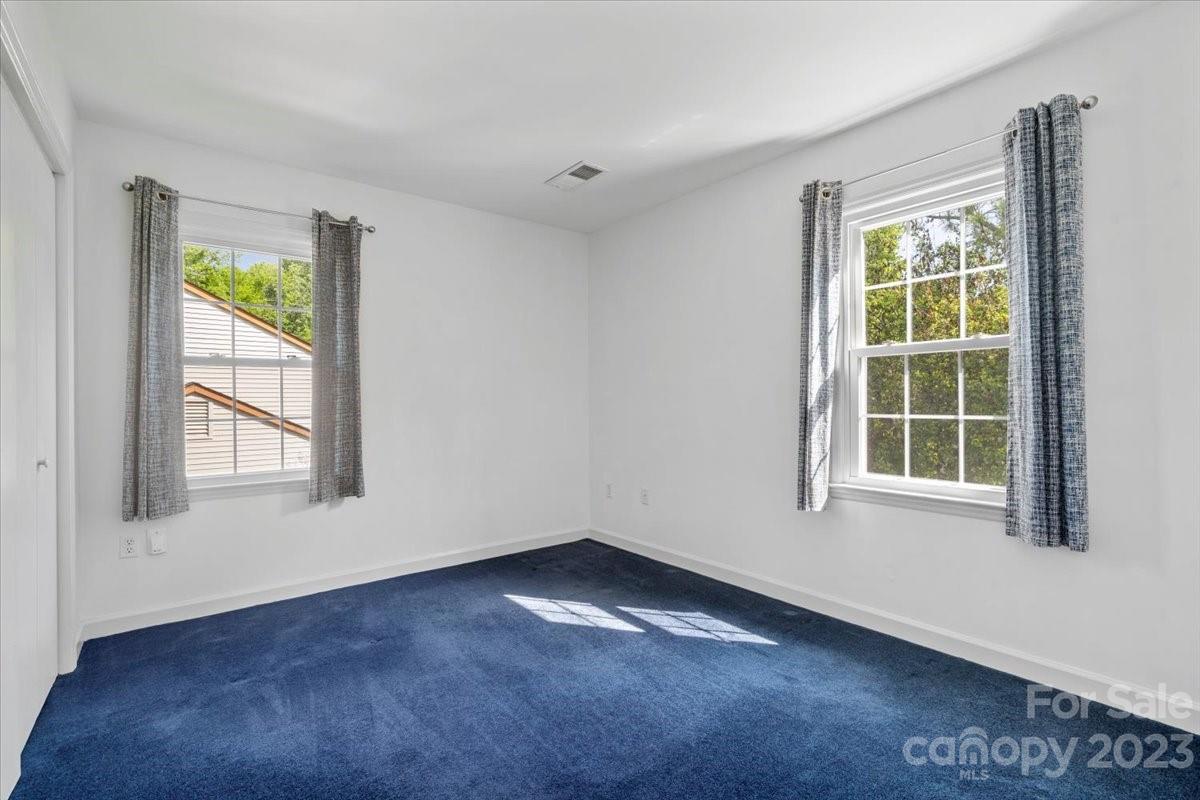 12112 Painted Tree Road Charlotte, NC 28226 - Photo 19 of 41 an empty room with a window