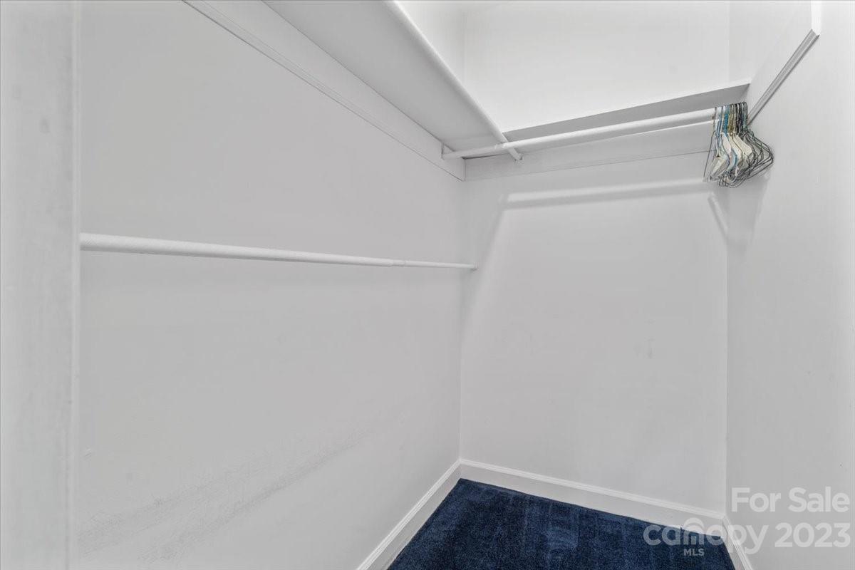 12112 Painted Tree Road Charlotte, NC 28226 - Photo 25 of 41 a view of small space with racks on the wall