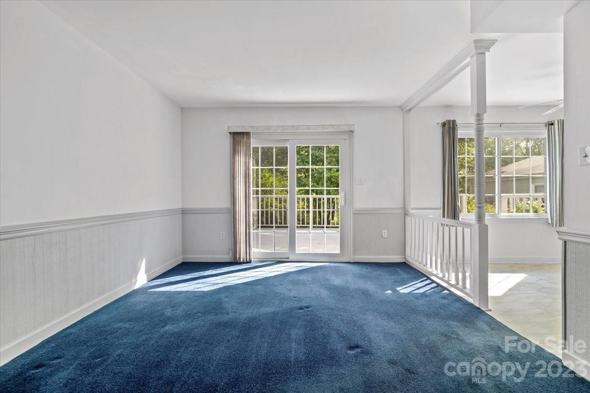 12112 Painted Tree Road Charlotte, NC 28226 - Photo 6 of 41 a view of an empty room with a window