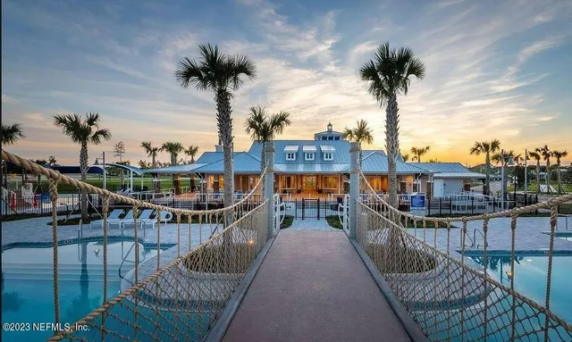 a balcony with tall trees
