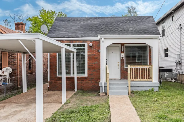 a house view with a garden space