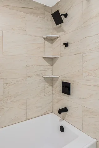 a bathroom with a sink and a shower