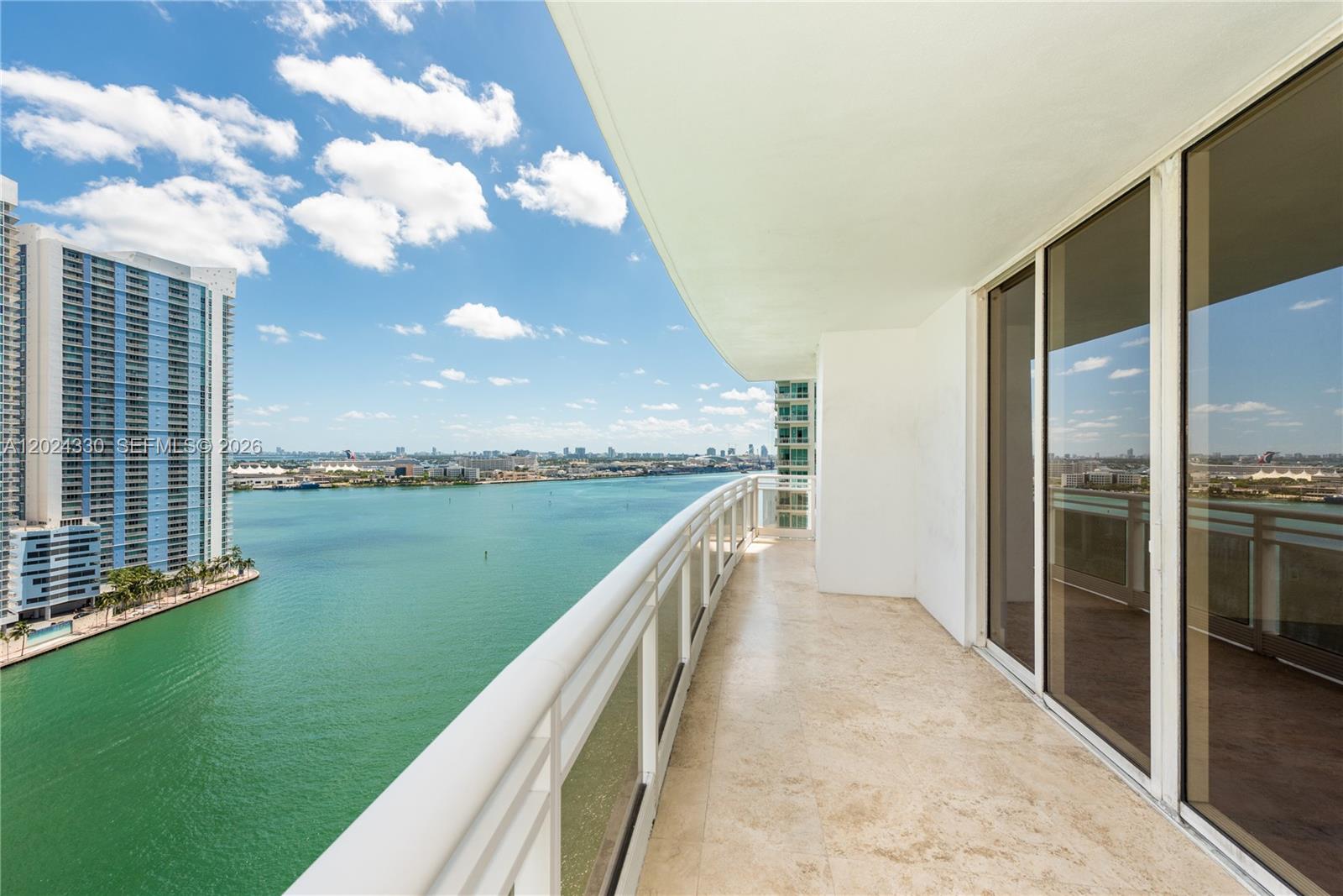 901 Brickell Key Boulevard, Unit 2006 Miami, FL 33131 - Photo 7 of 41 Spacious main Balcony - W/Marble Floors
