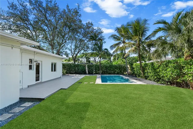 a view of a room with a large window
