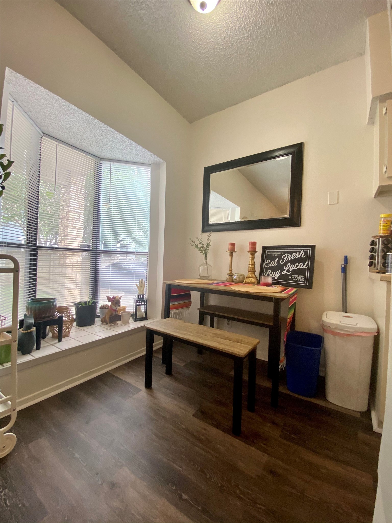 2604 Salado Street, Unit 102 Austin, TX 78705 - Photo 2 of 8 a living room with furniture and a floor to ceiling window