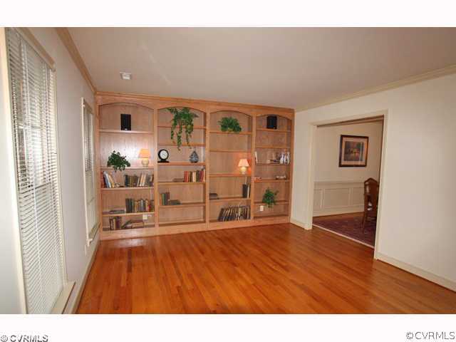 15203 Powell Grove Road Midlothian, VA 23112 - Photo 2 of 12 a living room with furniture and a large window