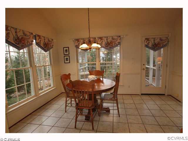 15203 Powell Grove Road Midlothian, VA 23112 - Photo 7 of 12 a dining room with furniture and window