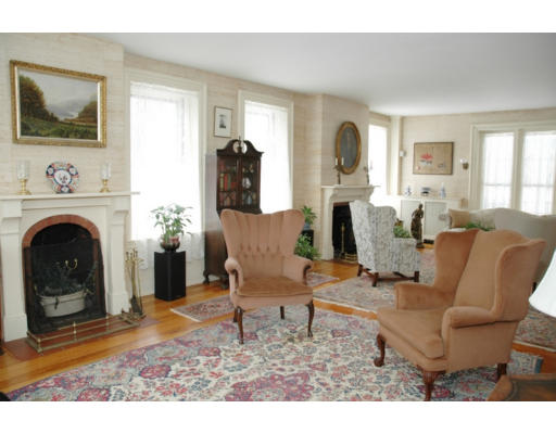 106 Elm Street Concord, MA 01742 - Photo 12 of 15 a living room with furniture and a fireplace