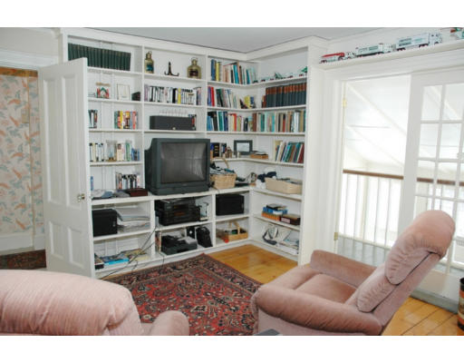 106 Elm Street Concord, MA 01742 - Photo 14 of 15 a living room with furniture cabinets and a window
