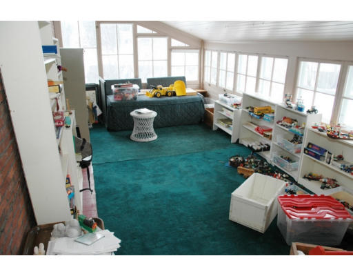 106 Elm Street Concord, MA 01742 - Photo 15 of 15 a living room with furniture and a window