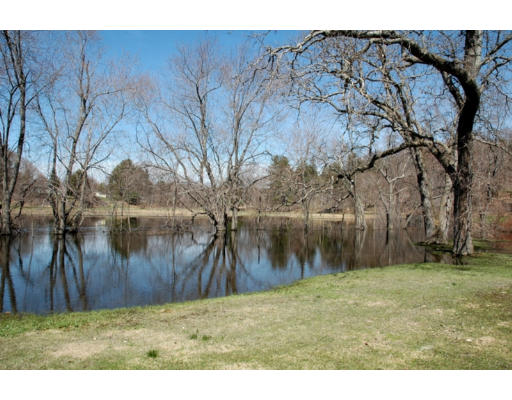 106 Elm Street Concord, MA 01742 - Photo 2 of 15 a backyard of a house with lots of green space
