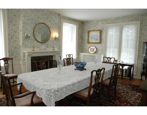 106 Elm Street Concord, MA 01742 - Photo 3 of 15 a view of a dining room with furniture and wooden floor