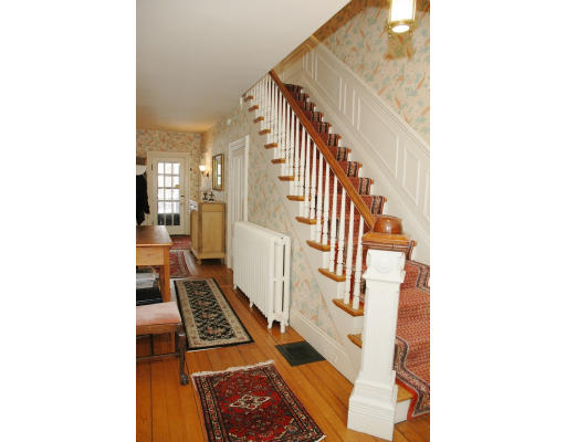 106 Elm Street Concord, MA 01742 - Photo 8 of 15 a view of an entryway with staircase