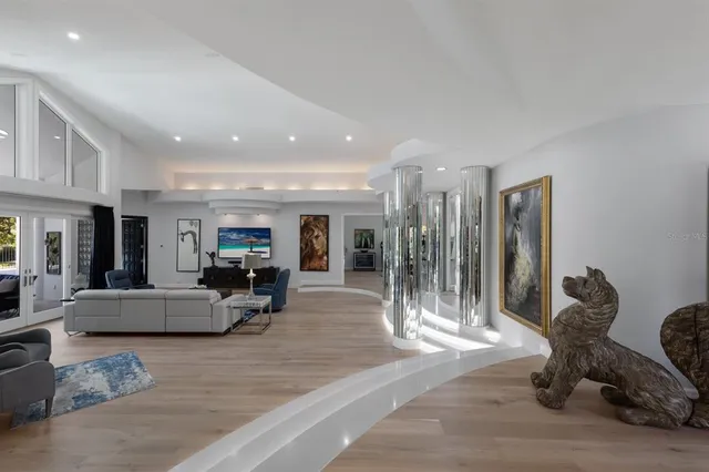 a kitchen with cabinets appliances a sink and a counter top