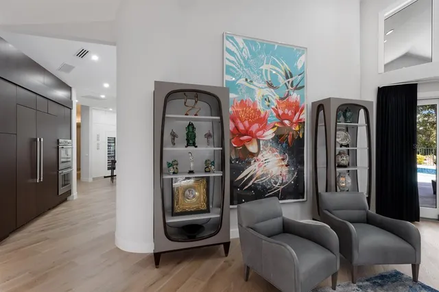 a kitchen with a sink and cabinets