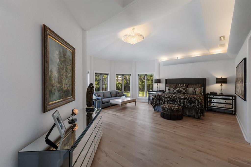 691 Eagle Watch Lane Osprey, FL 34229 - Photo 32 of 100 a living room with furniture and a large window