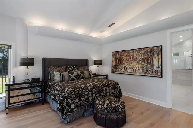 a view of a hallway with paintings on the wall