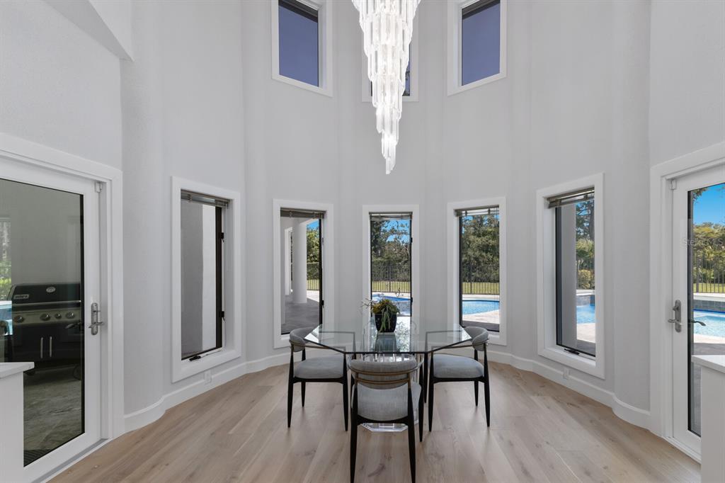 691 Eagle Watch Lane Osprey, FL 34229 - Photo 51 of 100 a view of a livingroom with furniture and window