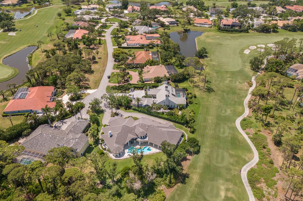 691 Eagle Watch Lane Osprey, FL 34229 - Photo 6 of 100 an aerial view of residential houses with outdoor space
