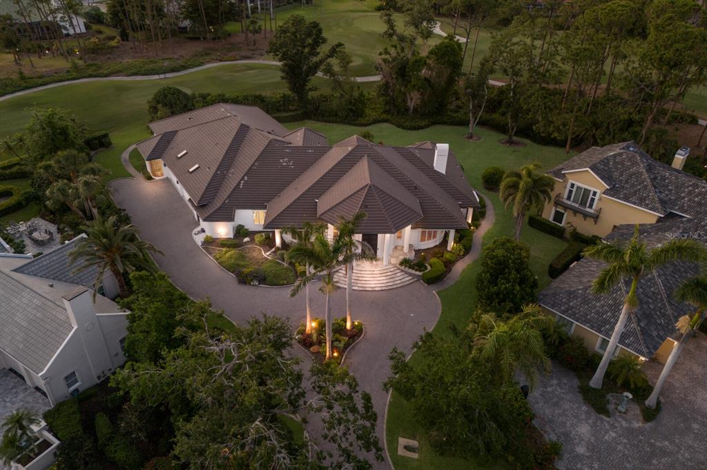 691 Eagle Watch Lane Osprey, FL 34229 - Photo 94 of 100 an aerial view of a house with garden space and street view