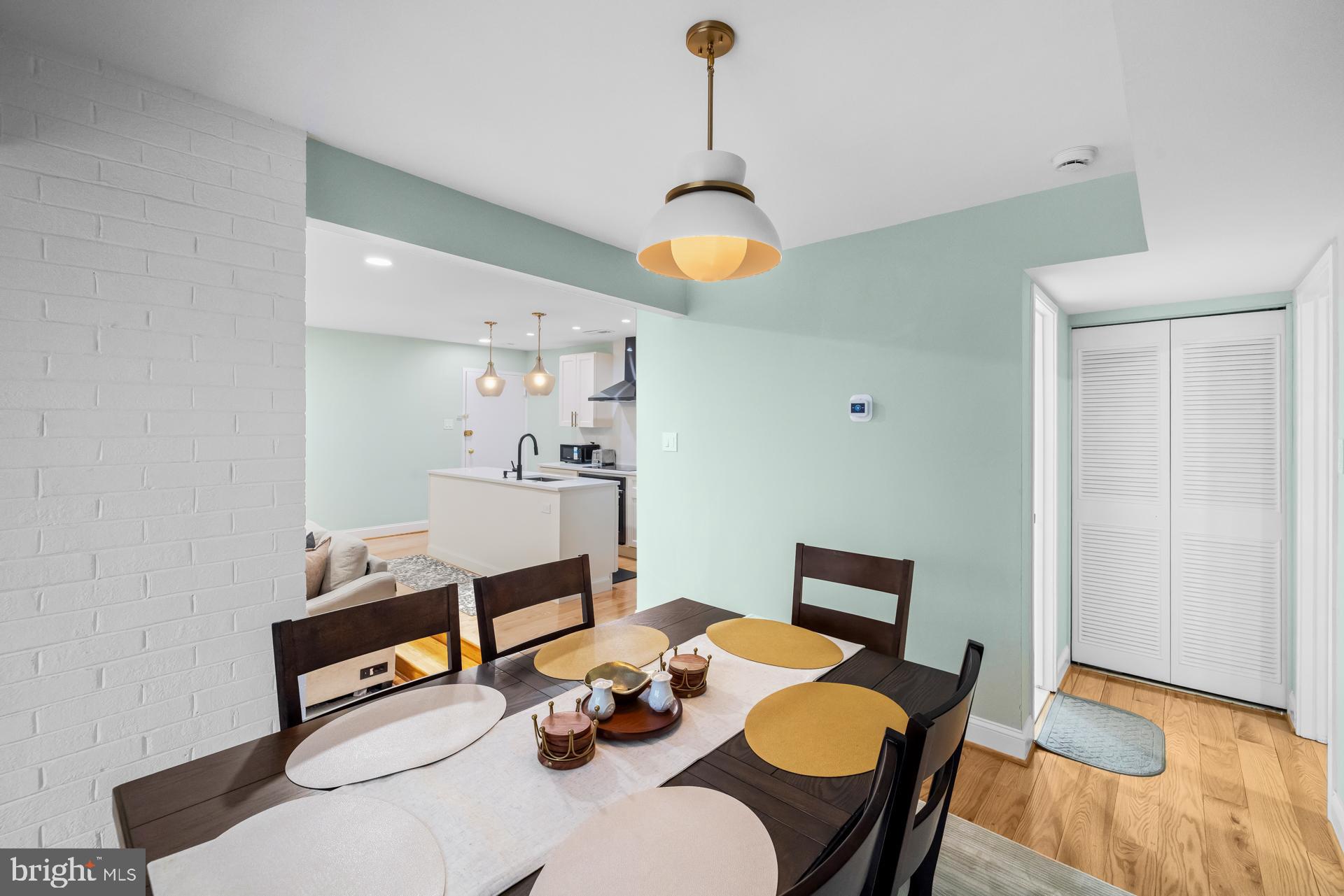 9820 Georgia Avenue, Unit 21302 Silver Spring, MD 20902 - Photo 12 of 24 Modern dining area with inviting ambiance.
