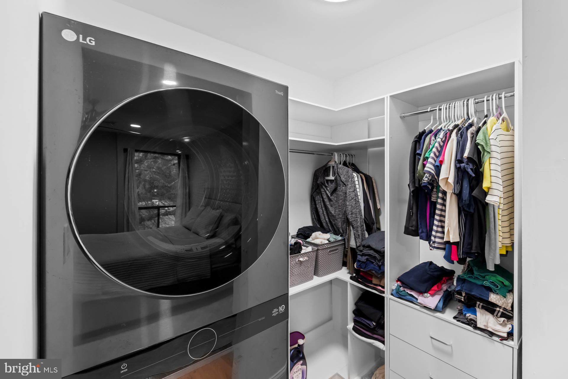 9820 Georgia Avenue, Unit 21302 Silver Spring, MD 20902 - Photo 20 of 24 Nice laundry space with organized storage.