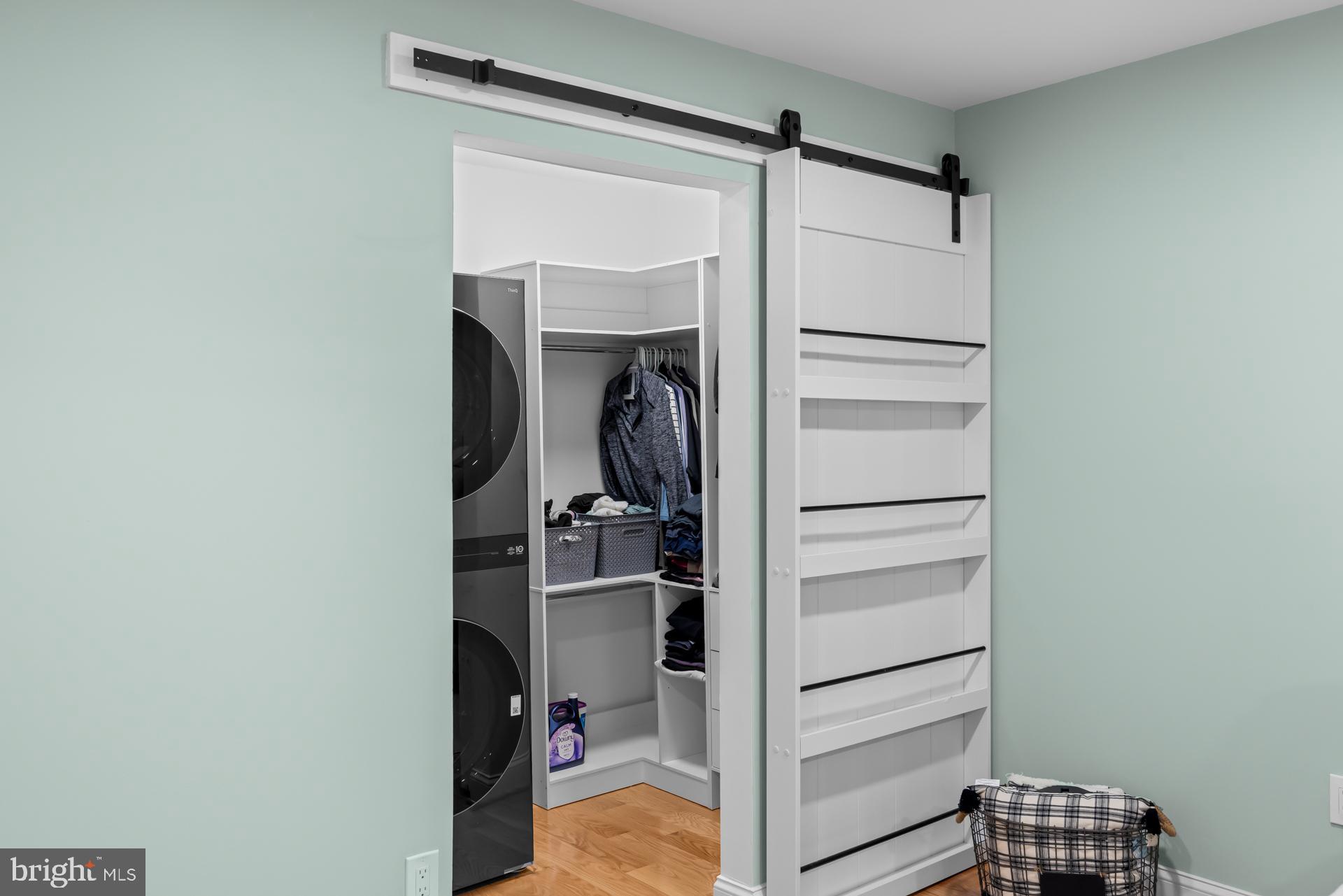 9820 Georgia Avenue, Unit 21302 Silver Spring, MD 20902 - Photo 22 of 24 Sleek closet with modern sliding door.