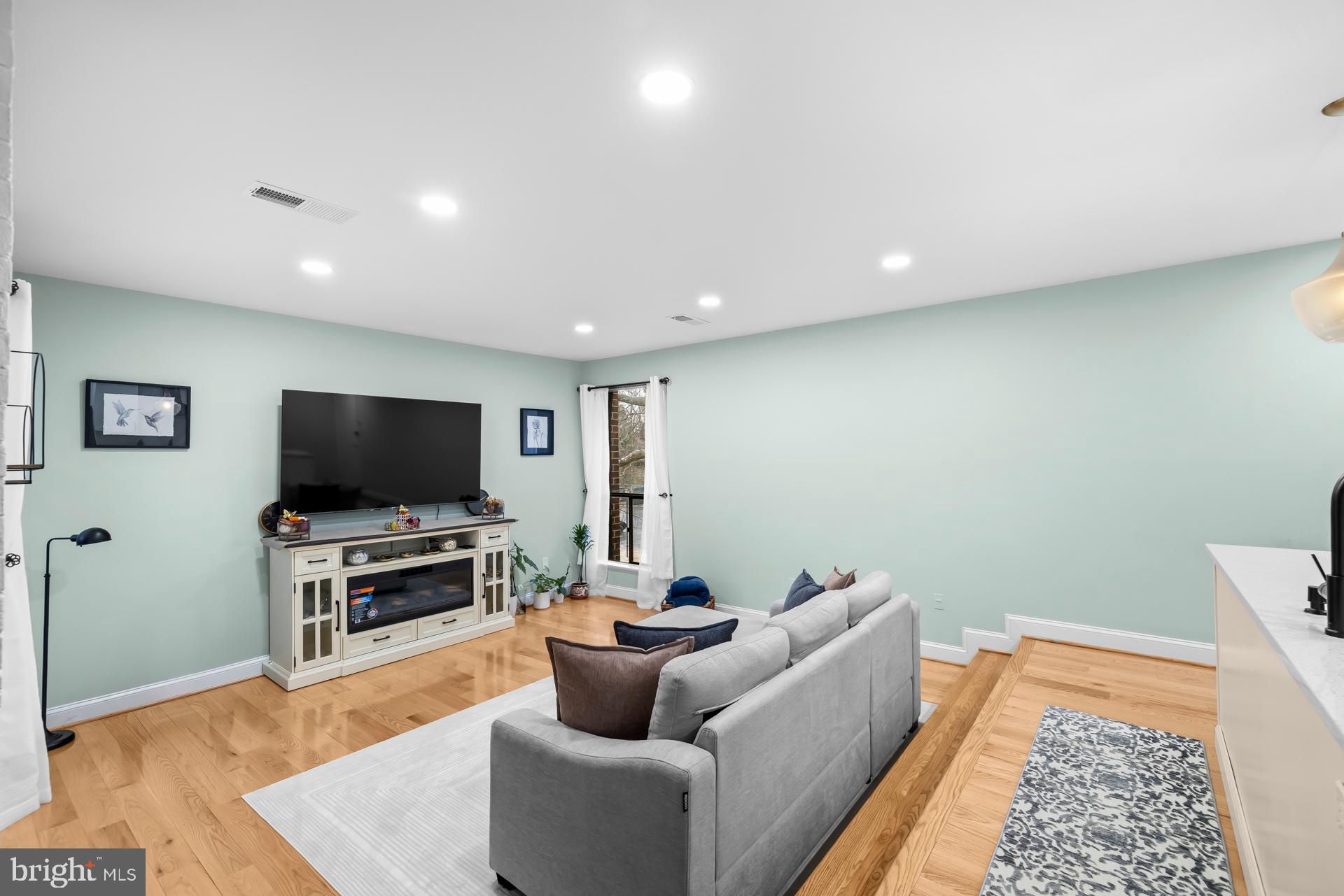 9820 Georgia Avenue, Unit 21302 Silver Spring, MD 20902 - Photo 9 of 24 Bright and inviting living space awaits you.