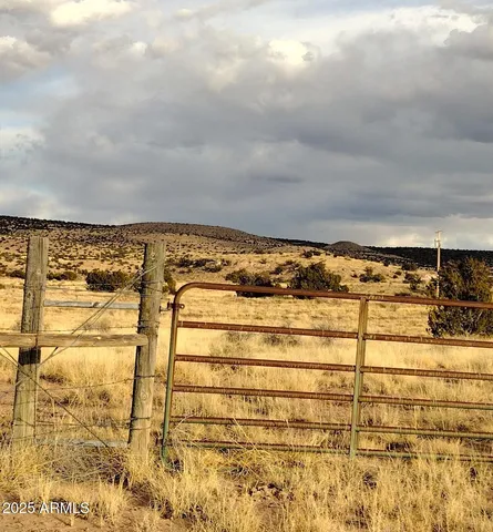 a view of wooden fence and snow