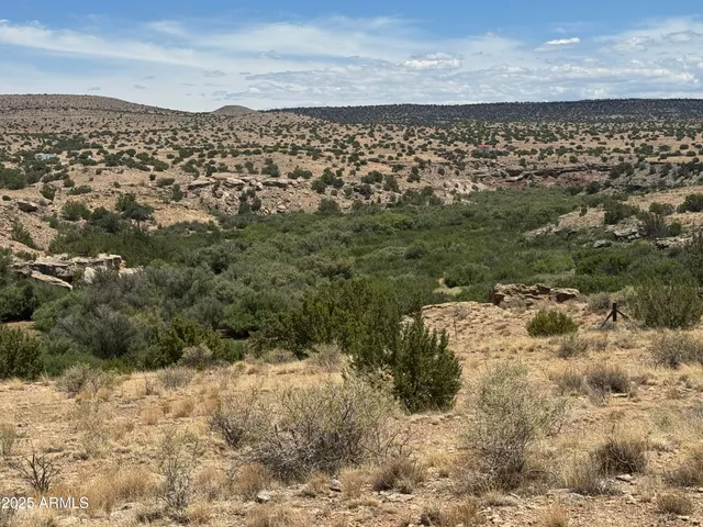a view of mountain view with lots of trees
