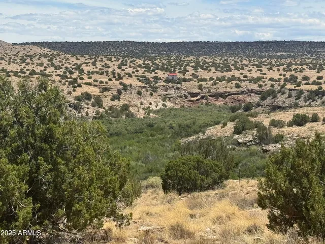 a view of street next to a building